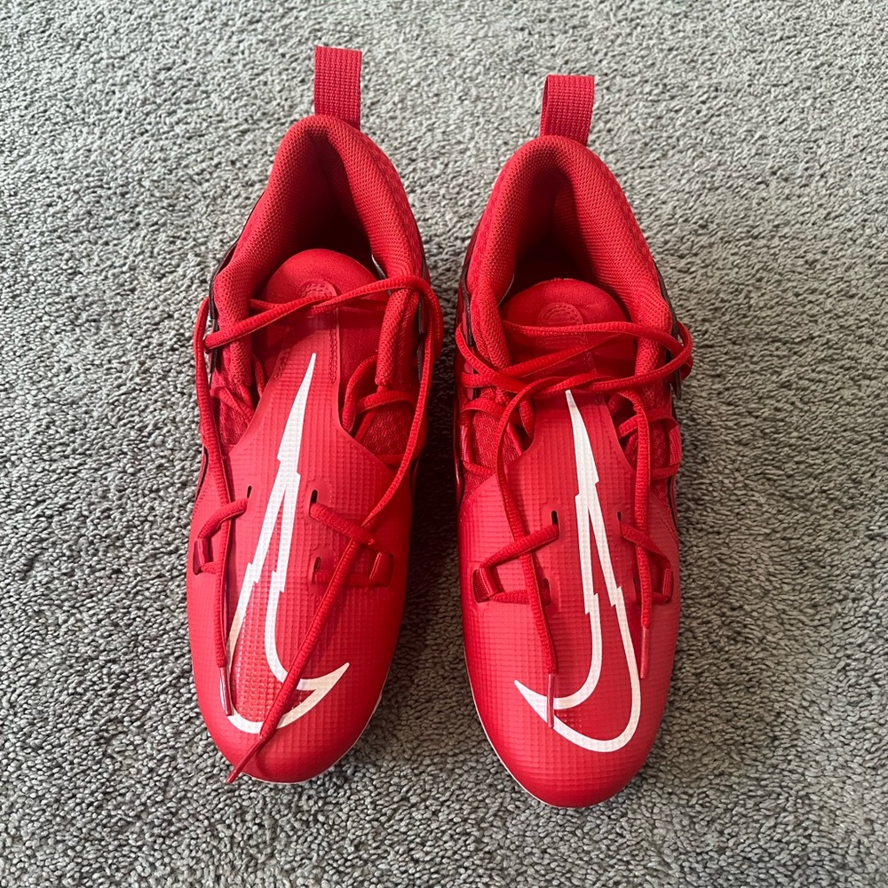 Red Nike football shoes